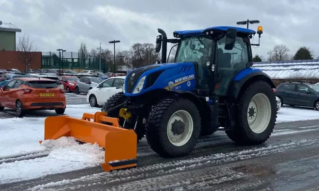 An image of Total Gritting Solutions Tractor doing snow clearance