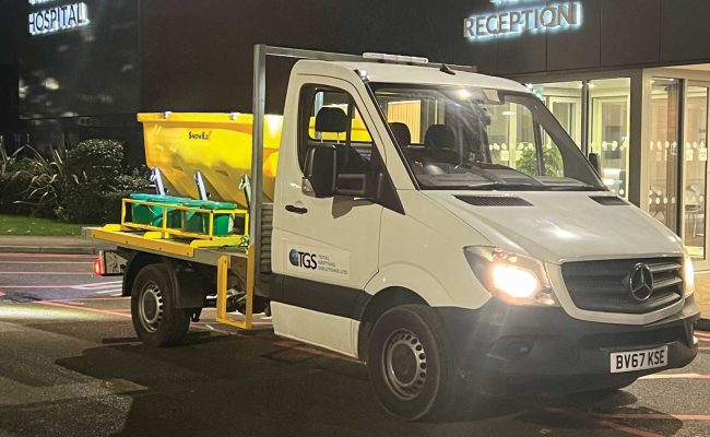 An image of Total Gritting Services Gritting van out on the road.
